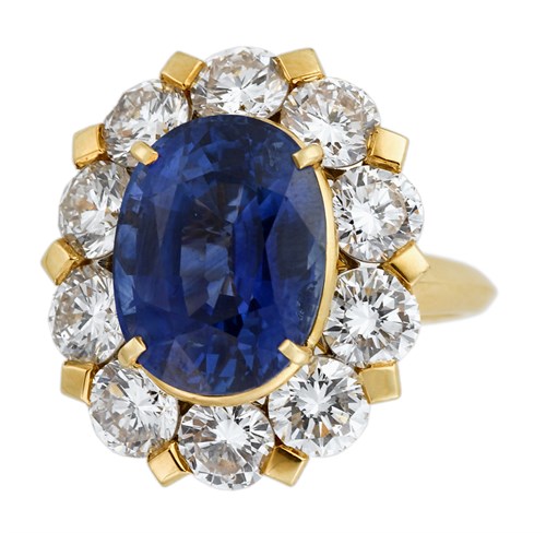 Lot 14 - 18 karat yellow gold diamond and sapphire ring