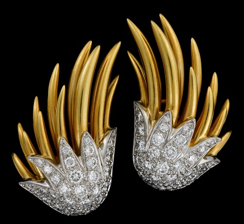 Lot 75 - 18 karat yellow gold, platinum and diamond 'wing' earrings