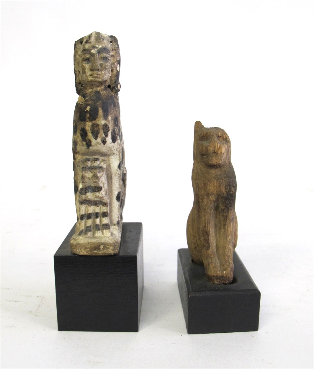 Lot 260 - Two Egyptian figures on stands