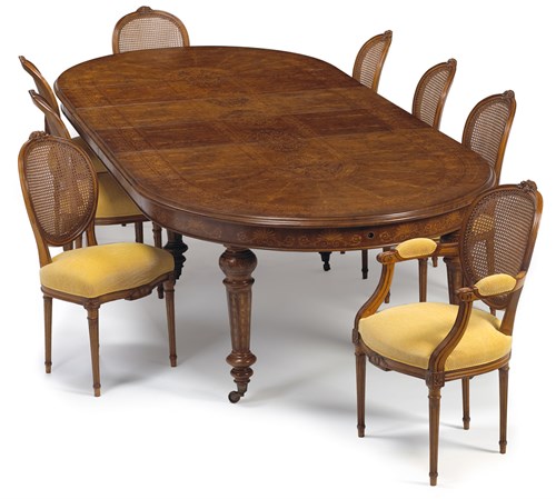 Lot 29 - French marquetry inlaid walnut extending dining table and eight dining chairs