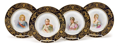 Lot 9 - Four Sèvres style hand-painted and gilt decorated porcelain cabinet plates