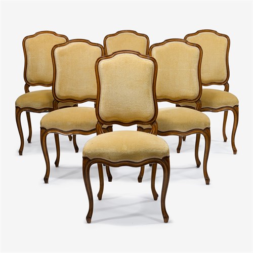Lot 72 - Set of twelve Louis XV provincial style walnut side chairs