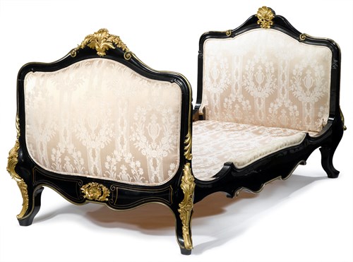 Lot 6 - Louis XV style gilt mounted ebonized oak daybed