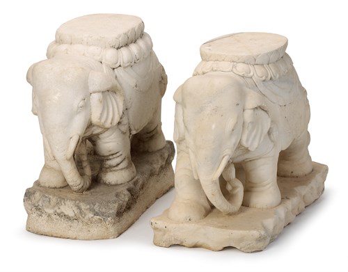 Lot 67 - Near pair of white marble elephant stools