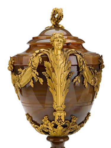 Lot 321 - An exceptional pair of Louis XVI style gilt bronze mounted agate and bloodstone covered urns