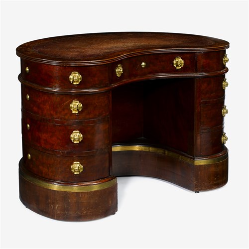 Lot 163 - Edwardian mahogany leather inset kidney shaped desk