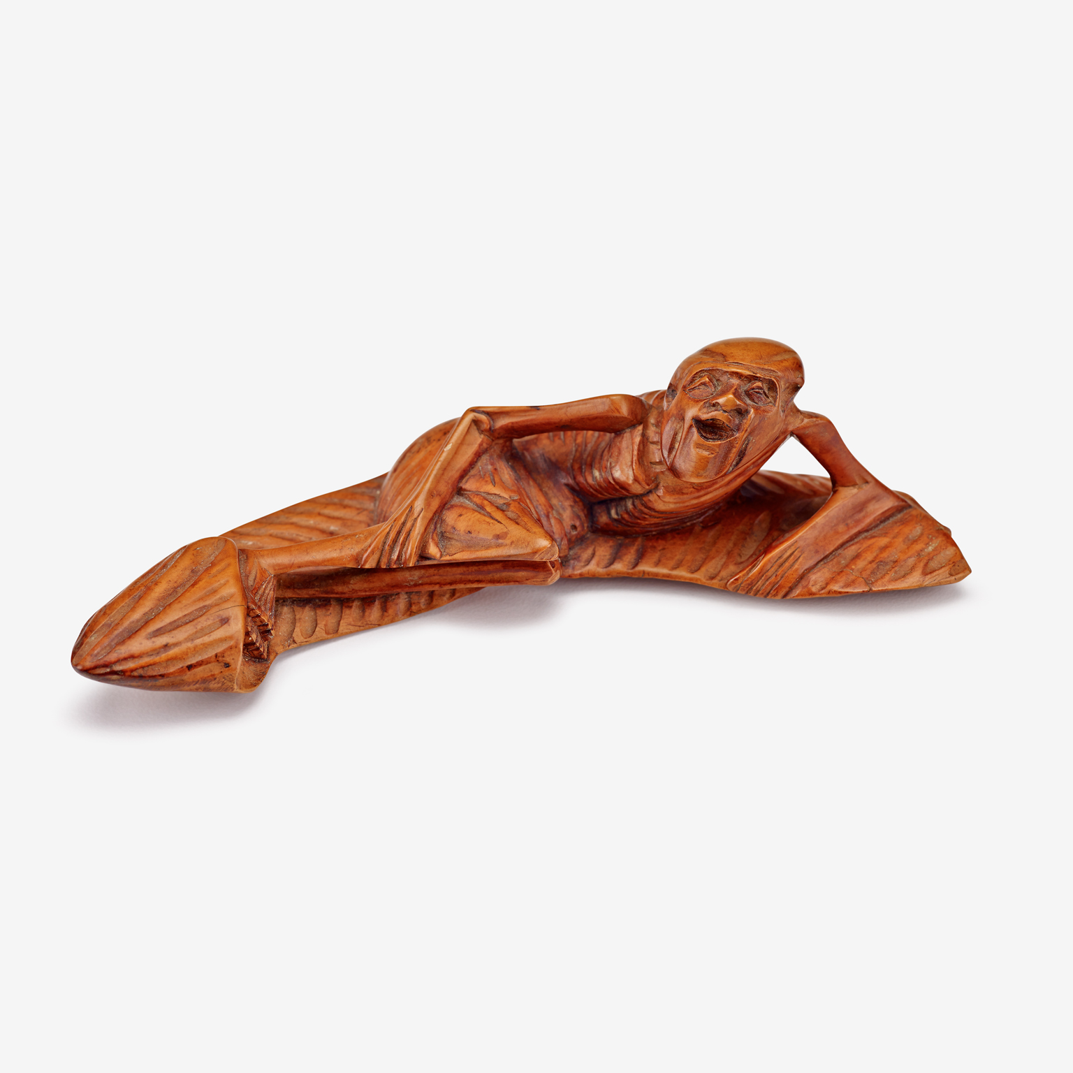 Lot 722 - A Chinese carved bamboo wrist rest and a