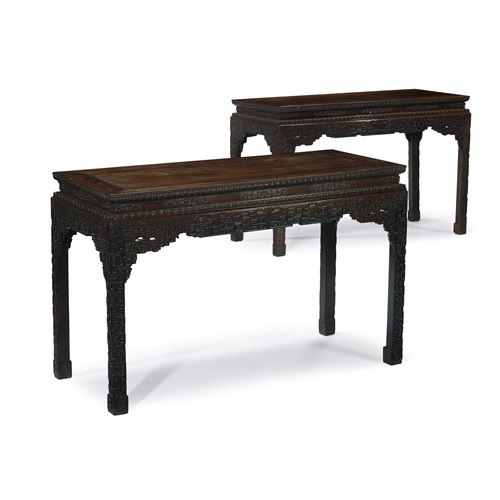 Lot 172 - *A fine and rare pair of Chinese carved hardwood, possibly "huanghuali", corner-leg painting tables, Tiaozhuo