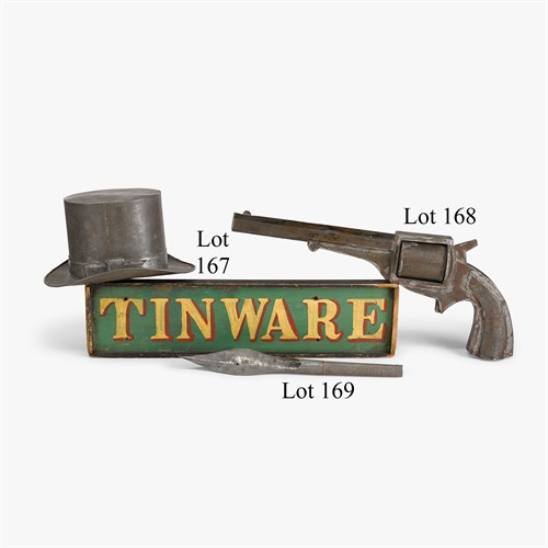 Lot 168 - Tenth anniversary oversized tinware pistol