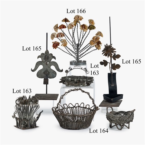 Lot 166 - Tenth anniversary tinware flower arrangement