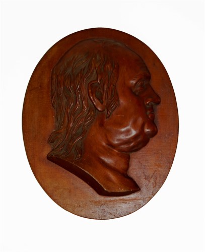 Lot 90 - Relief carved oval profile plaque of Benjamin Franklin (1706-1790)