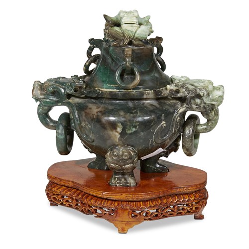 Lot 124 - A Chinese mottled green hardstone censer with dragon mask handles