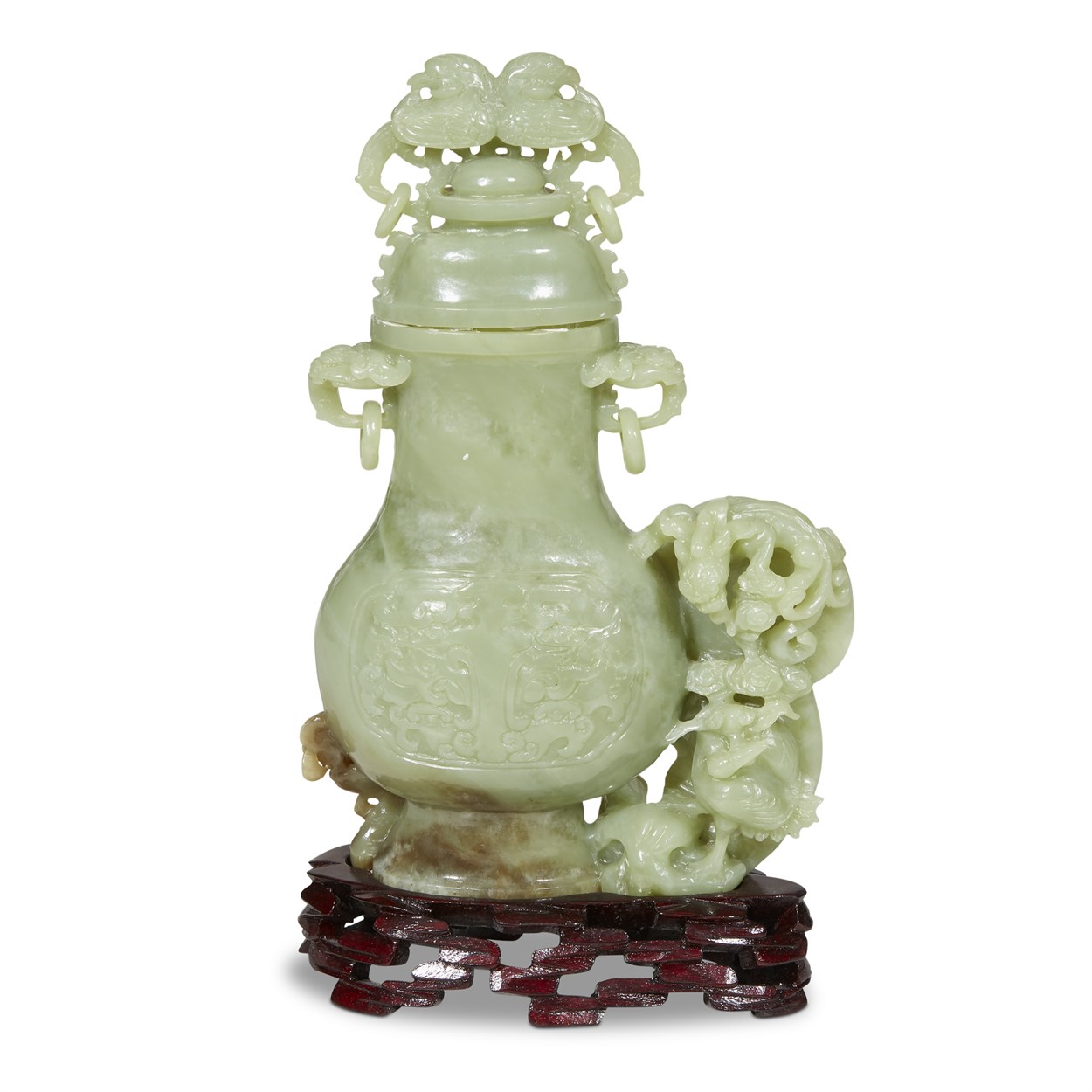 Lot 126 - A Chinese carved green jade 'crane and dragon' vase and cover