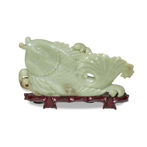 Lot 129 - A Chinese pale celadon jade carving of fish and pearl