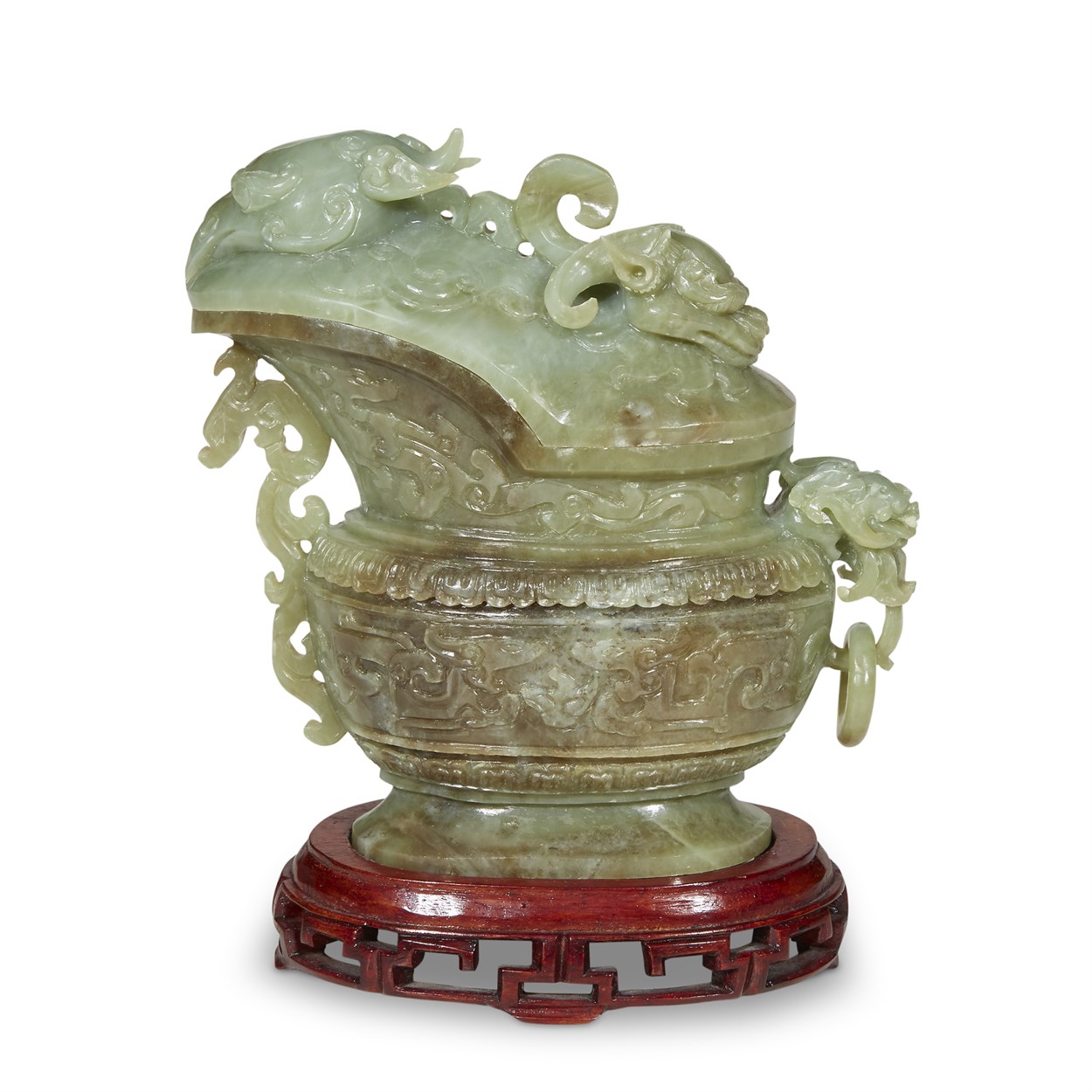 Lot 135 - A Chinese celadon and green jade Guang-form vessel and cover