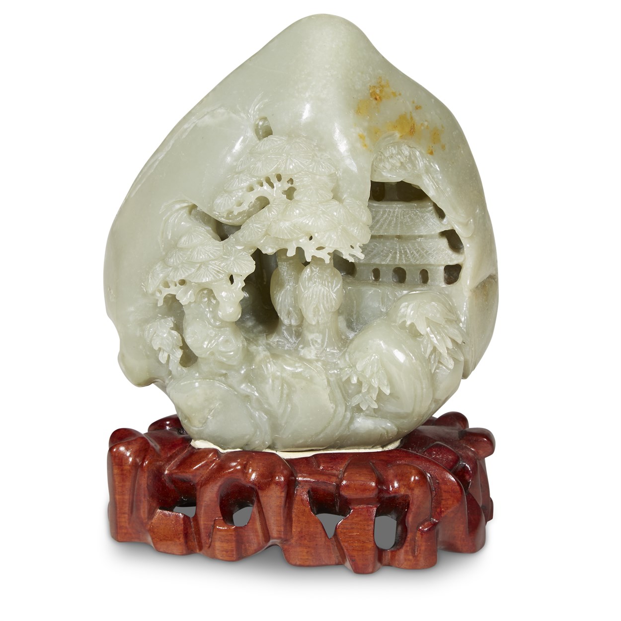 Lot 136 - A Chinese carved celadon jade boulder of scholars under a pine tree