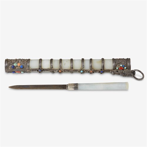 Lot 142 - A Mongolian white jade and hardstone-mounted silver utensil set