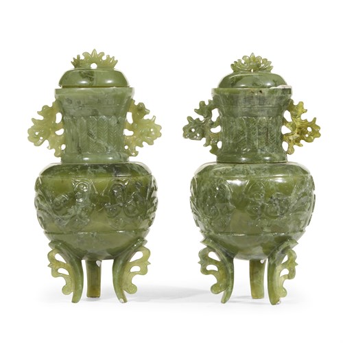 Lot 146 - A pair of Chinese green hardstone globular vases and covers