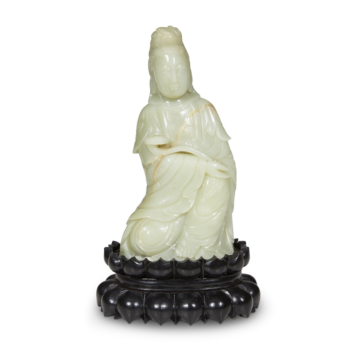 Lot 149 - A Chinese pale celadon jade figure of Guanyin