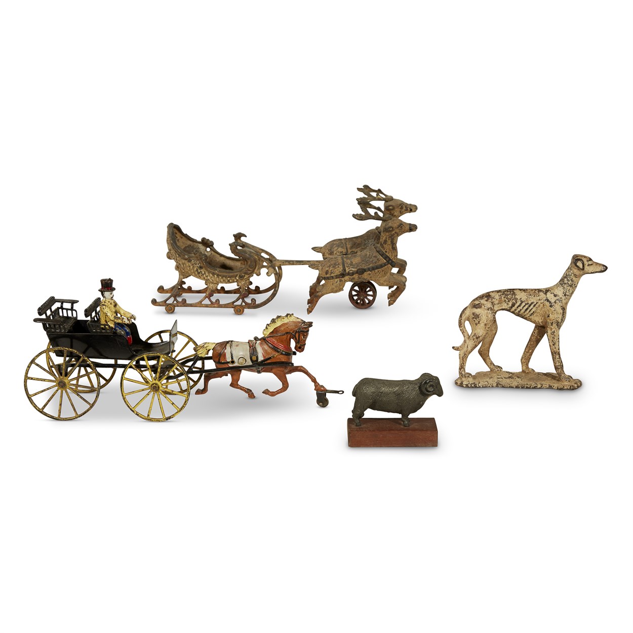 Lot 77 - Antique cast iron horse-drawn carriage with driver
