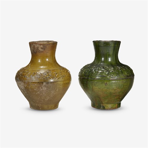 Lot 231 - A Chinese yellow glazed and a green glazed pottery wine jar, Hu
