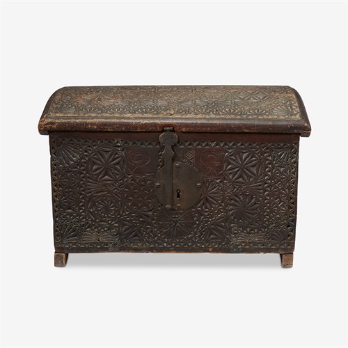 Lot 200 - Dome-top chip-carved chest