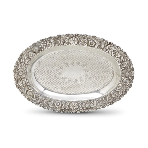 Lot 252 - Sterling silver repoussé platter from the Winder and Tucker Families of North Carolina