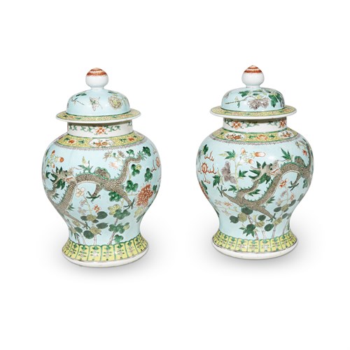 Lot 158 - A pair of Chinese famille verte 'dragon' jars and covers