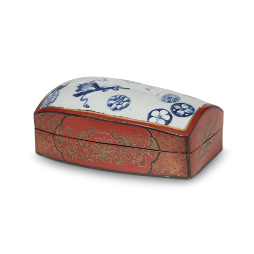 Lot 161 - A Chinese porcelain and lacquer box and cover