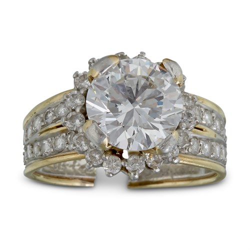 Lot 110 - A diamond, eighteen karat gold and platinum ring