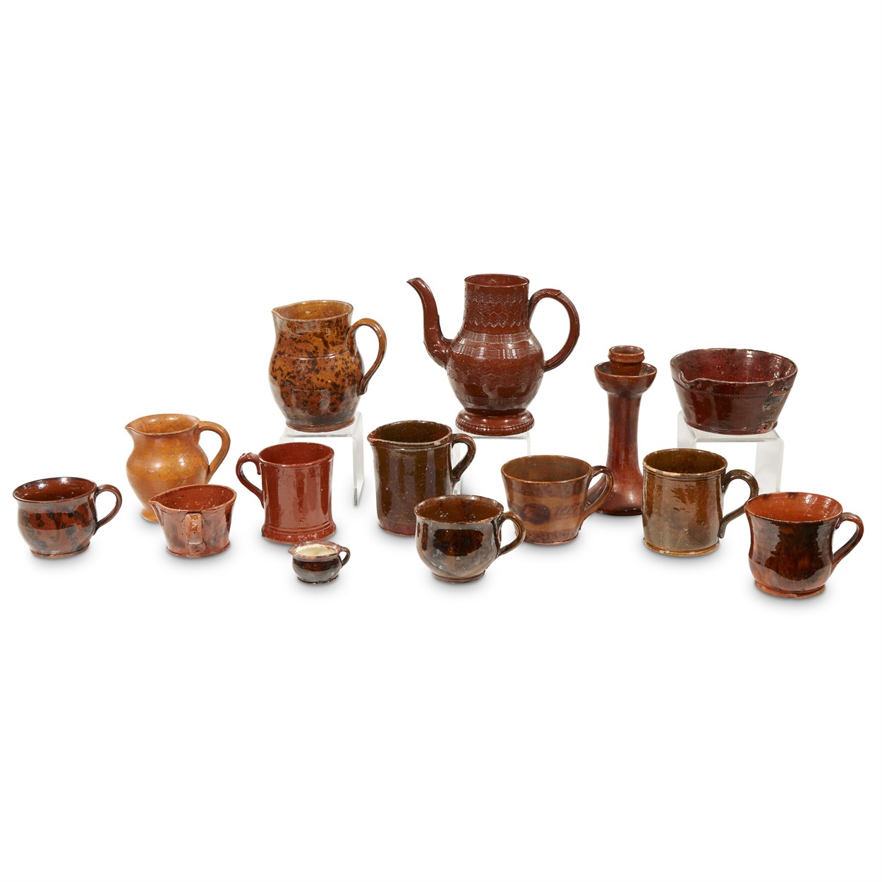 Lot 69 - Group of fourteen brown-glazed ceramic wares