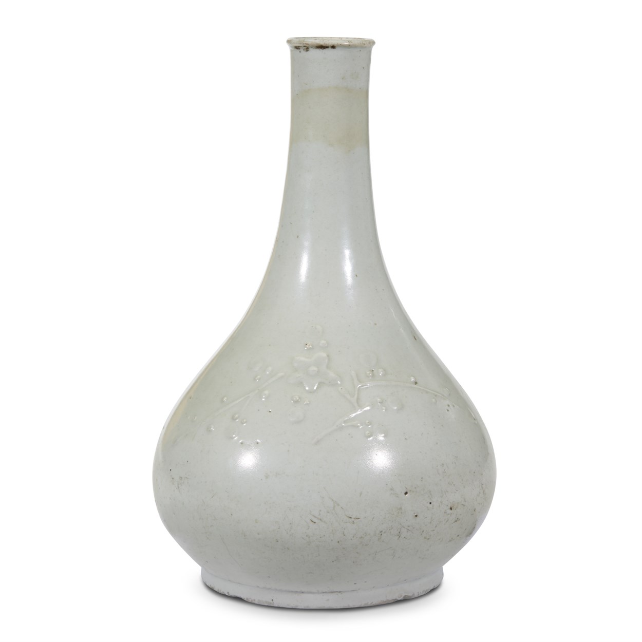 Lot 109 - A Korean white porcelain bottle vase with applied prunus spray and bamboo