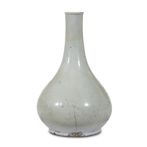 Lot 109 - A Korean white porcelain bottle vase with applied prunus spray and bamboo