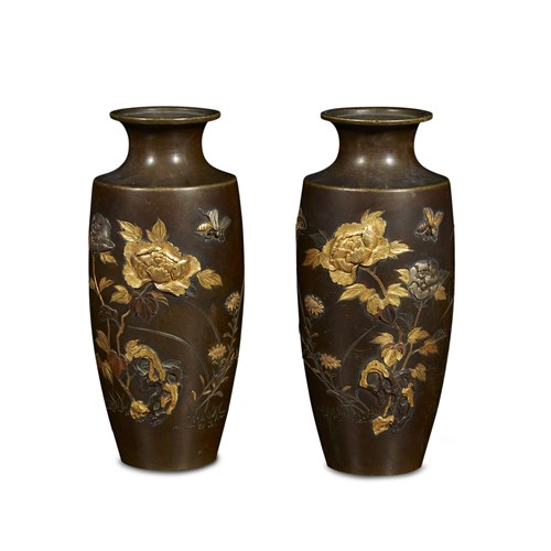 Lot 54 - A pair of Japanese mixed metal-inlaid bronze vases