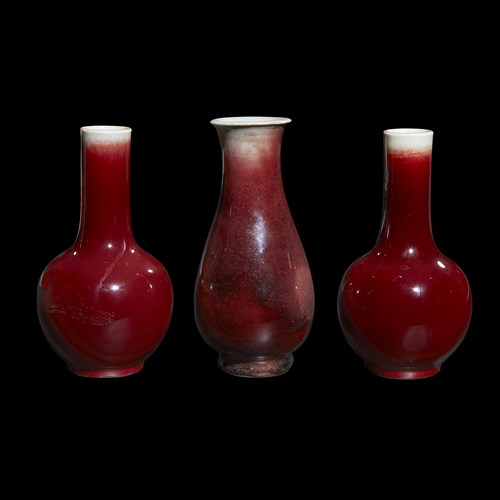 Lot 279 - Three Chinese copper-red glazed vases