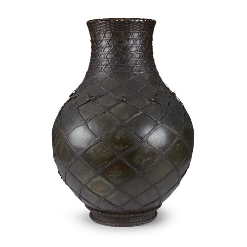 Lot 58 - A Japanese patinated bronze vase with woven wire "wicker" exterior