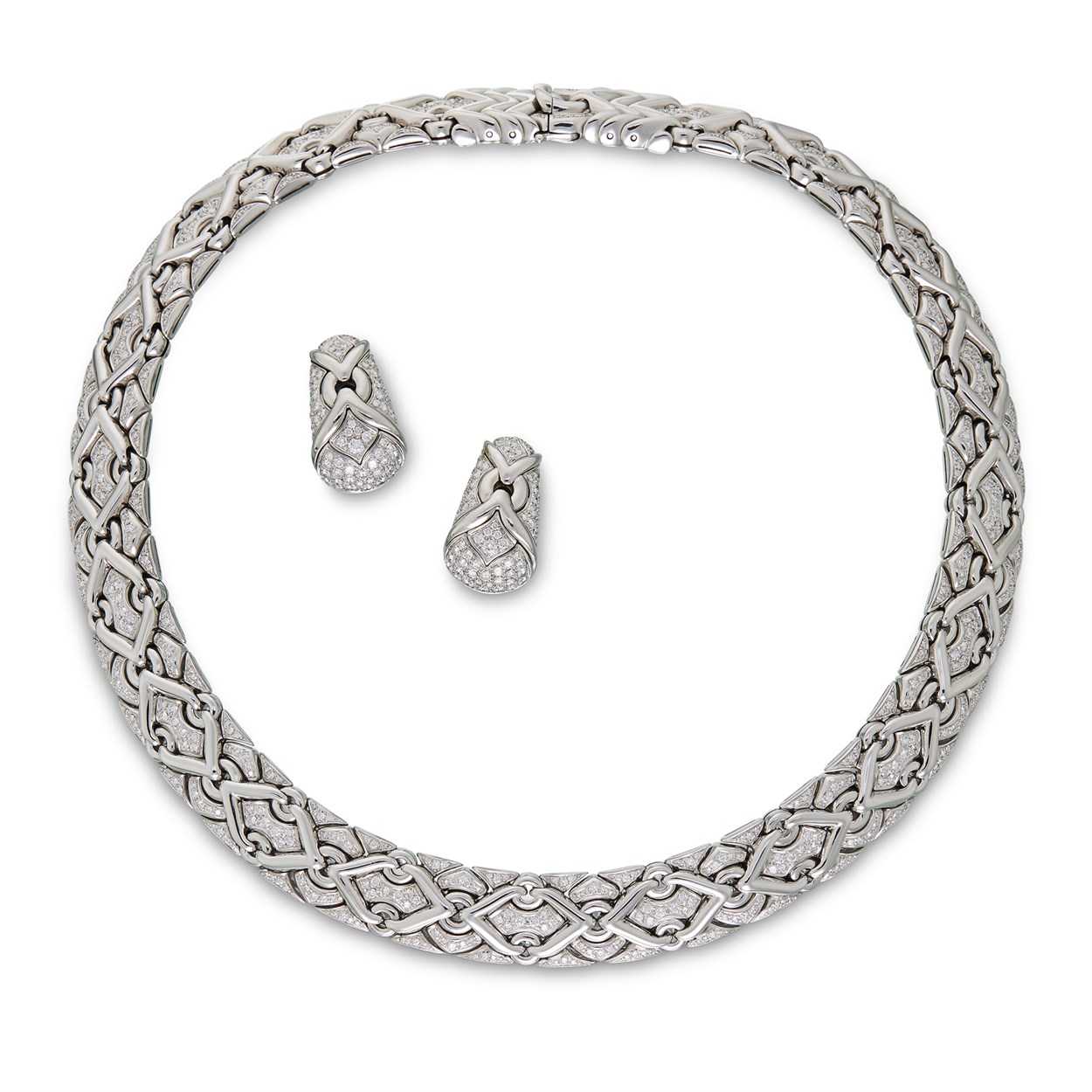 Lot 96 - A diamond and eighteen karat white gold necklace and earrings, Bulgari
