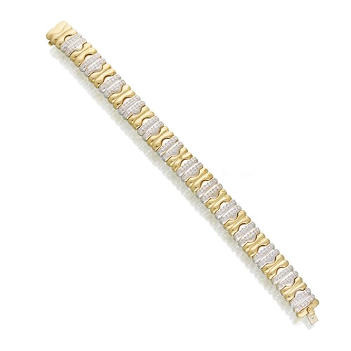 Lot 152 - A diamond and eighteen karat two-tone gold bracelet