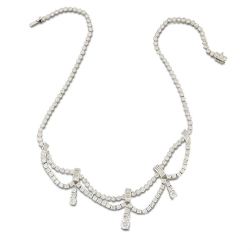 Lot 66 - A diamond and eighteen karat white gold swag necklace