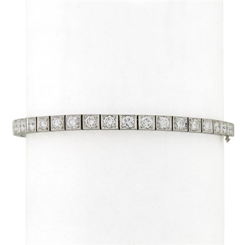 Lot 35 - A diamond and platinum line bracelet