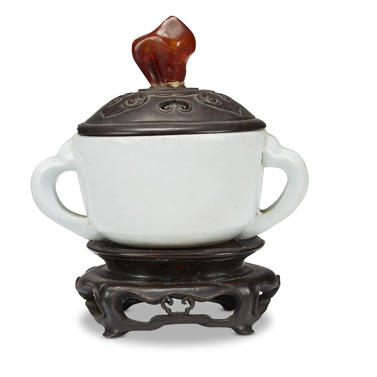 Lot 108 - A Korean porcelain twin-handled cup, with carved wood cover, amber finial
