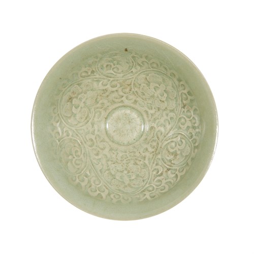 Lot 230 - A Chinese Yaozhou-type peony-molded conical bowl
