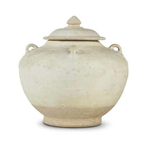 Lot 202 - A Thai white-glazed jar and cover