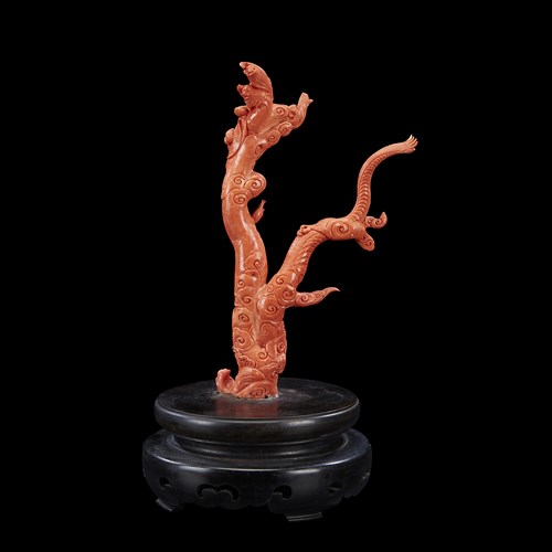 Lot 63 - A Japanese carved coral figure of Kannon with a Dragon