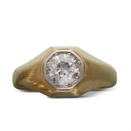 Lot 153 - A gent's diamond, fourteen karat gold and platinum ring