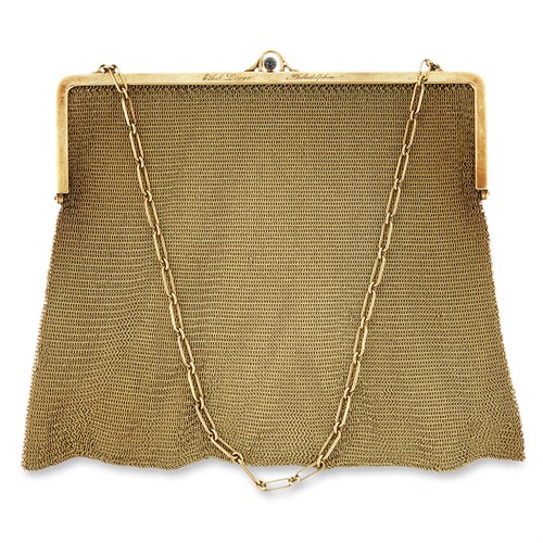 Lot 20 - A fourteen karat gold mesh purse