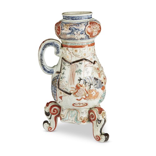Lot 86 - A Japanese molded porcelain coffee urn, Arita, decorated in an Imari palette