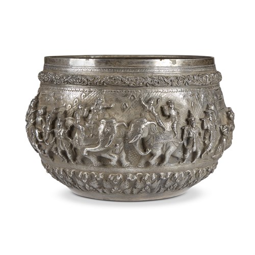 Lot 119 - A large Burmese silver repousse figural bowl