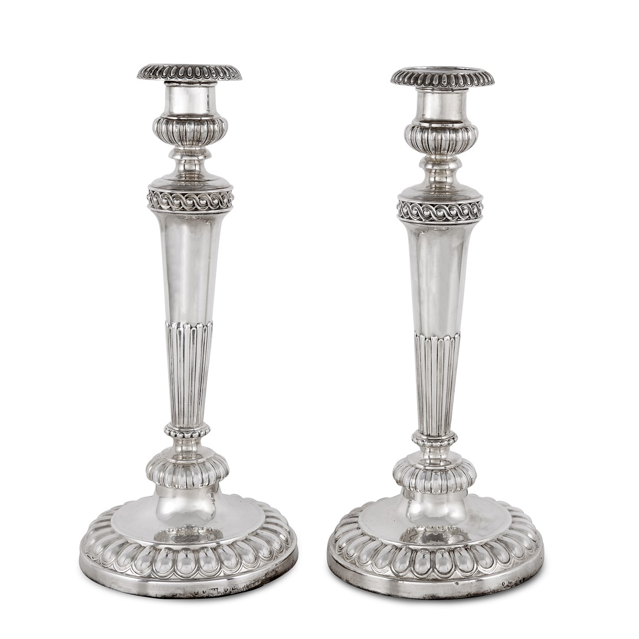 Lot 47 - A pair of George III sterling silver candlesticks
