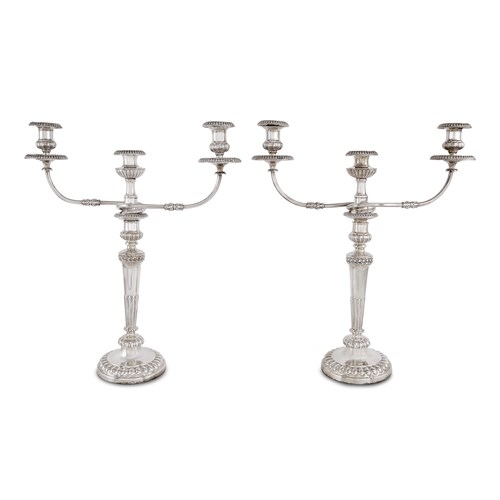 Lot 47 - A pair of George III sterling silver candlesticks